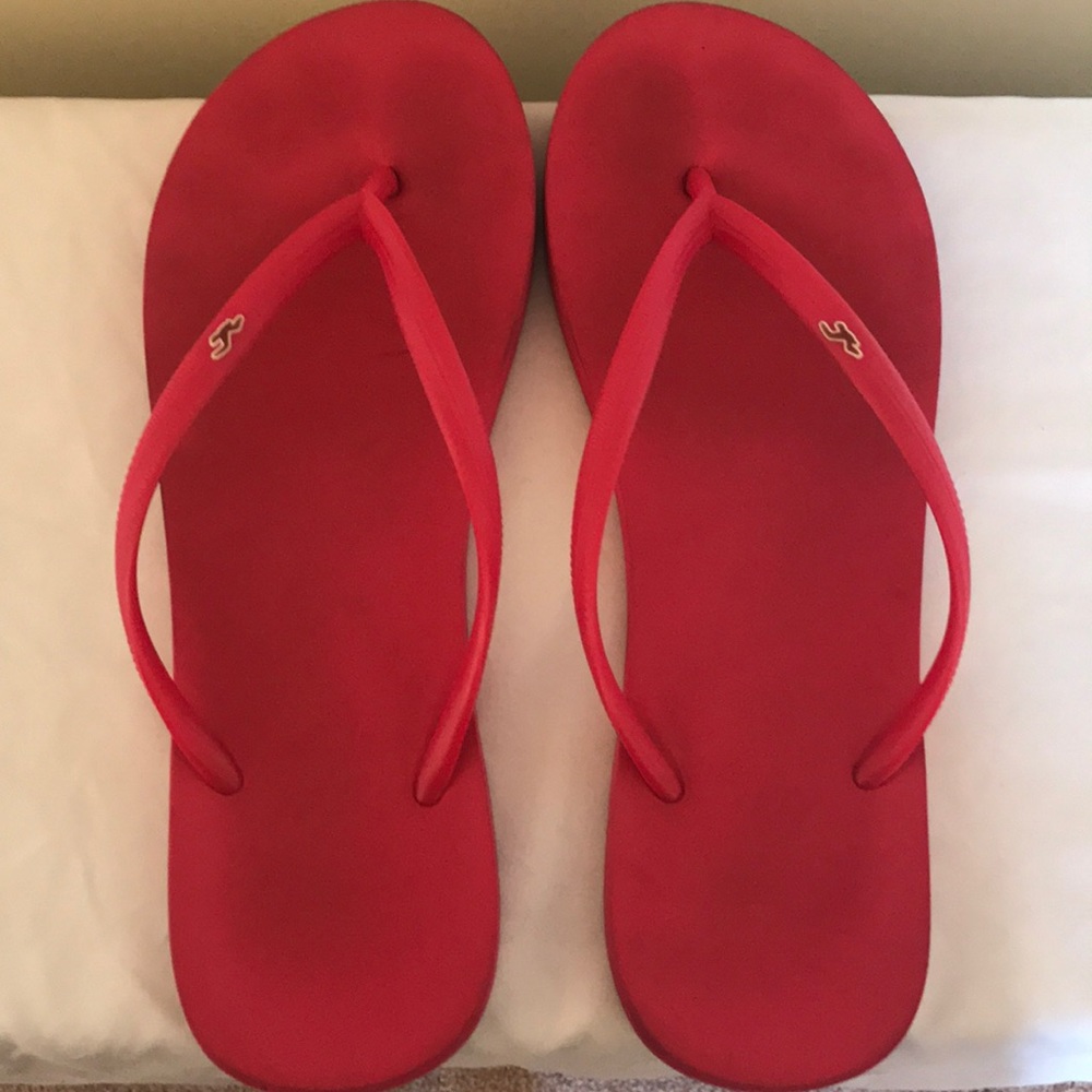 Pink Hollister flip flops